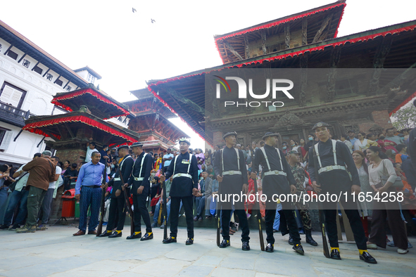 Nepal's Gurju Paltan stands guard ahead of the Phulpati procession in Kathmandu, Nepal, on October 10, 2024. 