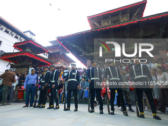 Nepal's Gurju Paltan stands guard ahead of the Phulpati procession in Kathmandu, Nepal, on October 10, 2024. (