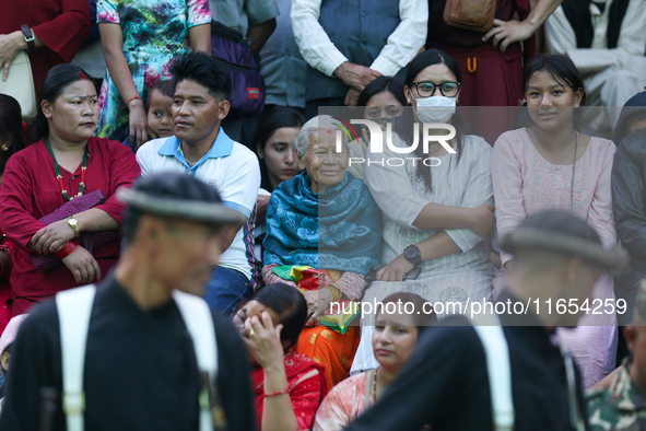 Spectators watch the procession of Phulpati in Kathmandu, Nepal, on October 10, 2024. 