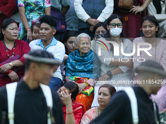 Spectators watch the procession of Phulpati in Kathmandu, Nepal, on October 10, 2024. (