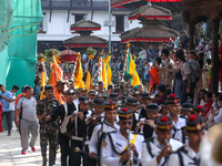 The Nepal Army band parades through the Kathmandu Durbar Square as they start the Phulpati procession in Kathmandu, Nepal, on October 10, 20...