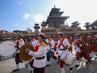 The Nepal Army band parades through the Kathmandu Durbar Square as they start the Phulpati procession in Kathmandu, Nepal, on October 10, 20...