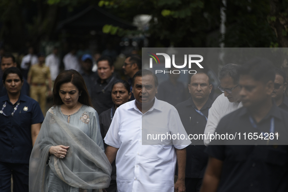 Mukesh Ambani, Chairman and Managing Director of Reliance Industries, and his wife Nita Ambani, an Indian philanthropist and businesswoman,...