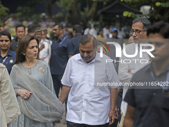 Mukesh Ambani, Chairman and Managing Director of Reliance Industries, and his wife Nita Ambani, an Indian philanthropist and businesswoman,...