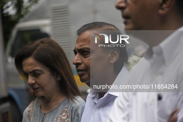 Mukesh Ambani, Chairman and Managing Director of Reliance Industries, and his wife Nita Ambani, an Indian philanthropist and businesswoman,...