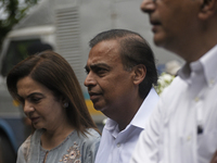 Mukesh Ambani, Chairman and Managing Director of Reliance Industries, and his wife Nita Ambani, an Indian philanthropist and businesswoman,...