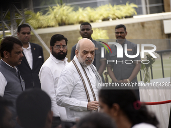 India's Home Minister Amit Shah arrives to pay tribute to the mortal remains of Indian industrialist Ratan Tata at the National Centre for t...