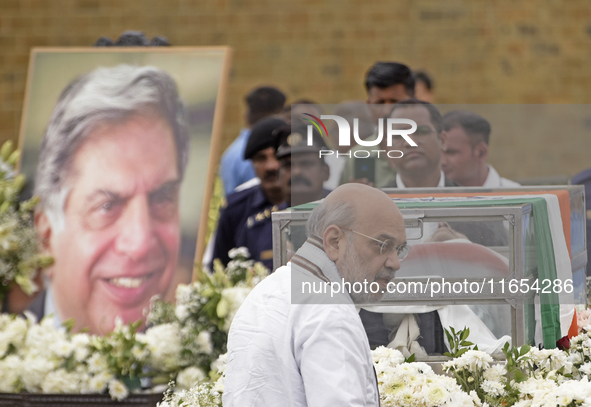 India's Home Minister Amit Shah arrives to pay tribute to the mortal remains of Indian industrialist Ratan Tata at the National Centre for t...