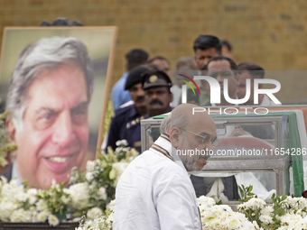 India's Home Minister Amit Shah arrives to pay tribute to the mortal remains of Indian industrialist Ratan Tata at the National Centre for t...