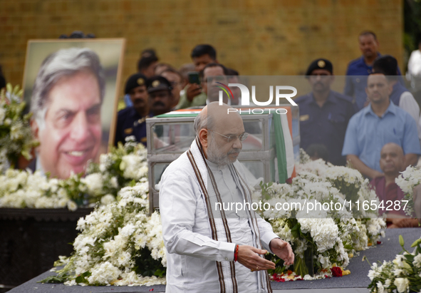 India's Home Minister Amit Shah arrives to pay tribute to the mortal remains of Indian industrialist Ratan Tata at the National Centre for t...