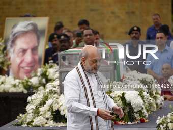 India's Home Minister Amit Shah arrives to pay tribute to the mortal remains of Indian industrialist Ratan Tata at the National Centre for t...