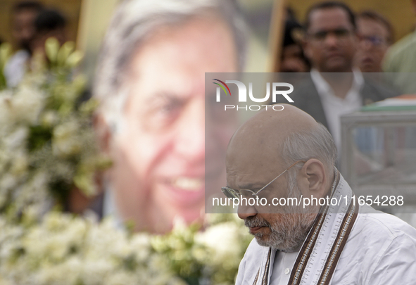 India's Home Minister Amit Shah arrives to pay tribute to the mortal remains of Indian industrialist Ratan Tata at the National Centre for t...