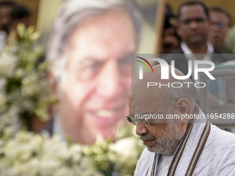 India's Home Minister Amit Shah arrives to pay tribute to the mortal remains of Indian industrialist Ratan Tata at the National Centre for t...