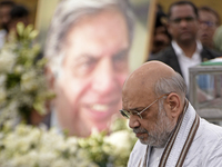 India's Home Minister Amit Shah arrives to pay tribute to the mortal remains of Indian industrialist Ratan Tata at the National Centre for t...