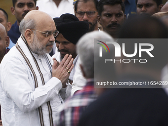 India's Home Minister Amit Shah arrives to pay tribute to the mortal remains of Indian industrialist Ratan Tata at the National Centre for t...