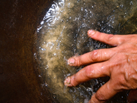 White sediment, typically caused by dissolved minerals like calcium and magnesium associated with water hardness, is visible in water at Teh...