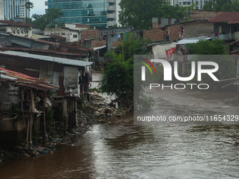 The atmosphere in a densely populated corner of Medan City, located by the banks of the Deli River in North Sumatra, Indonesia, on October 1...