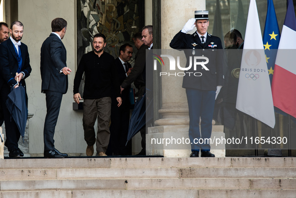 French President Emmanuel Macron and Ukrainian President Volodymyr Zelensky are at the Elysee Palace during the first bilateral summit of Ze...