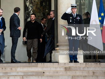 French President Emmanuel Macron and Ukrainian President Volodymyr Zelensky are at the Elysee Palace during the first bilateral summit of Ze...