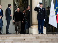 French President Emmanuel Macron and Ukrainian President Volodymyr Zelensky are at the Elysee Palace during the first bilateral summit of Ze...