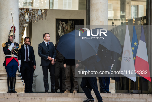 French President Emmanuel Macron and Ukrainian President Volodymyr Zelensky are at the Elysee Palace during the first bilateral summit of Ze...