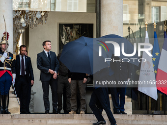 French President Emmanuel Macron and Ukrainian President Volodymyr Zelensky are at the Elysee Palace during the first bilateral summit of Ze...