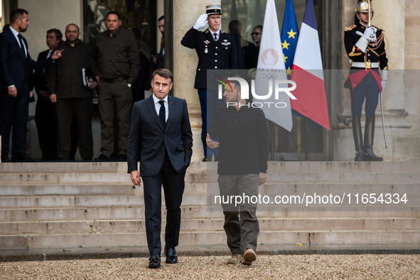 French President Emmanuel Macron and Ukrainian President Volodymyr Zelensky are at the Elysee Palace during the first bilateral summit of Ze...