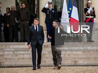 French President Emmanuel Macron and Ukrainian President Volodymyr Zelensky are at the Elysee Palace during the first bilateral summit of Ze...