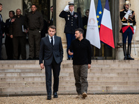 French President Emmanuel Macron and Ukrainian President Volodymyr Zelensky are at the Elysee Palace during the first bilateral summit of Ze...