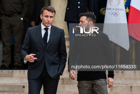 French President Emmanuel Macron and Ukrainian President Volodymyr Zelensky are at the Elysee Palace during the first bilateral summit of Ze...