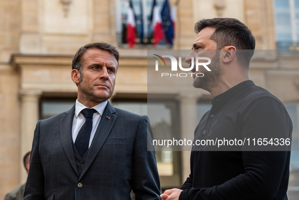 French President Emmanuel Macron and Ukrainian President Volodymyr Zelensky are at the Elysee Palace during the first bilateral summit of Ze...