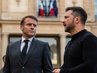 French President Emmanuel Macron and Ukrainian President Volodymyr Zelensky are at the Elysee Palace during the first bilateral summit of Ze...