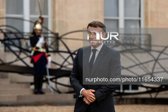 French President Emmanuel Macron and Ukrainian President Volodymyr Zelensky are at the Elysee Palace during the first bilateral summit of Ze...