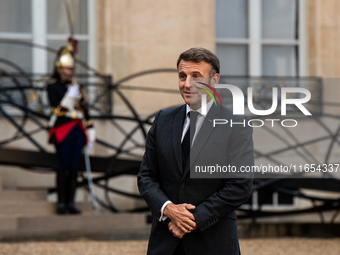 French President Emmanuel Macron and Ukrainian President Volodymyr Zelensky are at the Elysee Palace during the first bilateral summit of Ze...