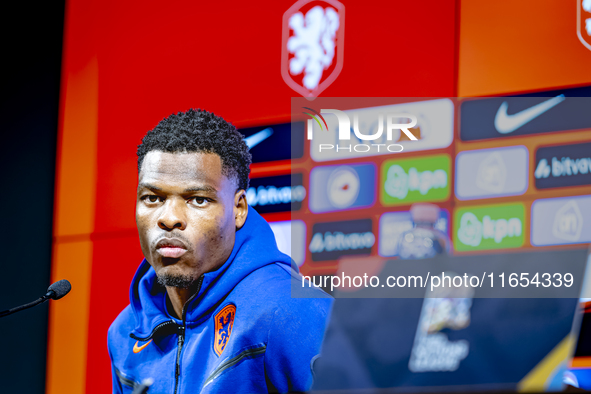 Netherlands defender Denzel Dumfries attends a press conference at the Puskas Arena for the UEFA Nations League season 2024-2025 in Budapest...