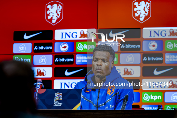 Netherlands defender Denzel Dumfries attends a press conference at the Puskas Arena for the UEFA Nations League season 2024-2025 in Budapest...