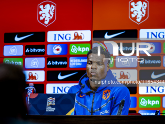 Netherlands defender Denzel Dumfries attends a press conference at the Puskas Arena for the UEFA Nations League season 2024-2025 in Budapest...