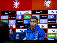 Netherlands defender Denzel Dumfries attends a press conference at the Puskas Arena for the UEFA Nations League season 2024-2025 in Budapest...