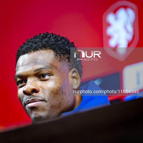 Netherlands defender Denzel Dumfries attends a press conference at the Puskas Arena for the UEFA Nations League season 2024-2025 in Budapest...