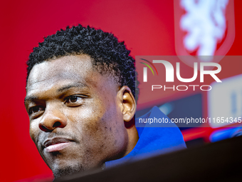 Netherlands defender Denzel Dumfries attends a press conference at the Puskas Arena for the UEFA Nations League season 2024-2025 in Budapest...