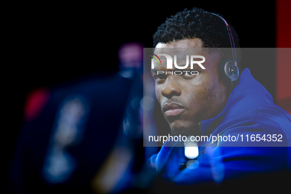 Netherlands defender Denzel Dumfries attends a press conference at the Puskas Arena for the UEFA Nations League season 2024-2025 in Budapest...