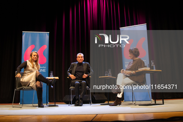 Jagoda Marinic, a German novelist, Michel Friedman, a German author, and Ferdos Forudastan, a German journalist, are on the stage during the...