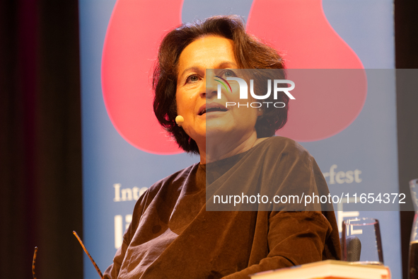 Ferdos Forudastan, a German journalist, is on the stage during the lit.cologne 2024 special edition, the international literature festival i...