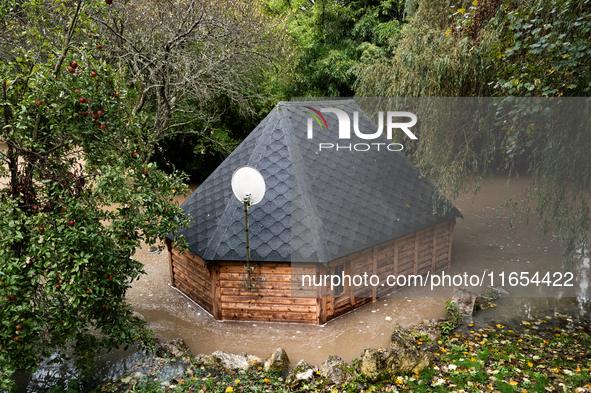 A small house is flooded in Pommeuse, Seine-et-Marne department, east of Paris, on October 10, 2024, as the heavy rains associated with the...