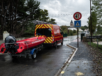 Firefighters respond to one incident after another, using a zodiac in Pommeuse, Seine-et-Marne department, east of Paris, on October 10, 202...