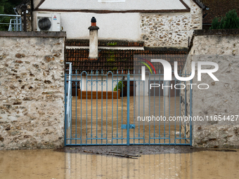 A flooded house is in Pommeuse, Seine-et-Marne department, east of Paris, on October 10, 2024, as the heavy rains associated with the Kirk l...