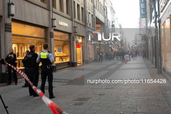 Police block the site at a shopping area after a knife attack in the city center of Cologne, Germany, on October 10, 2024. 