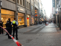 Police block the site at a shopping area after a knife attack in the city center of Cologne, Germany, on October 10, 2024. (