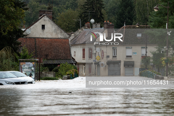 A flooded street is in Pommeuse, Seine-et-Marne department, east of Paris, on October 10, 2024, as the heavy rains associated with the Kirk...