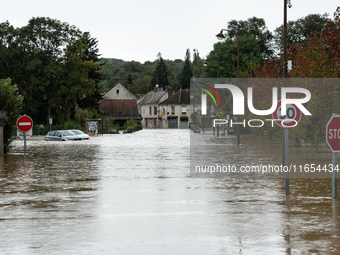 A flooded street is in Pommeuse, Seine-et-Marne department, east of Paris, on October 10, 2024, as the heavy rains associated with the Kirk...